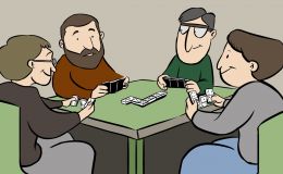 Grupo de jubilados jugando al dominó