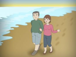 Pareja de jubilados paseando por la playa