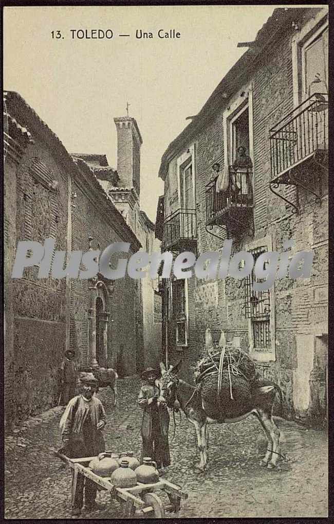 Trabajadores en una calle de toledo