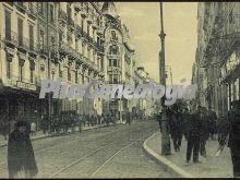 Calle de granada cruzada por las vías del tranvía