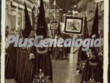 Semana santa en málaga: la cofradía del sepulcro a su paso por la calle de granada