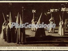 Frente de procesión de la hermandad de la sagrada cena sacramental en la semana santa en málaga