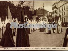 Semana santa en málaga: desfile de la cofradía de la sagrada cena sacramental en málaga
